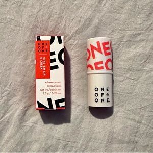 Vibrant, coral tinted lip Balm